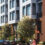 Multigenerational affordable housing community built around transport hub